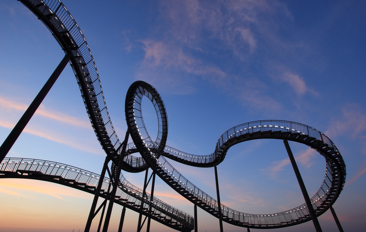 Roller coaster tracks with loops and swirls.