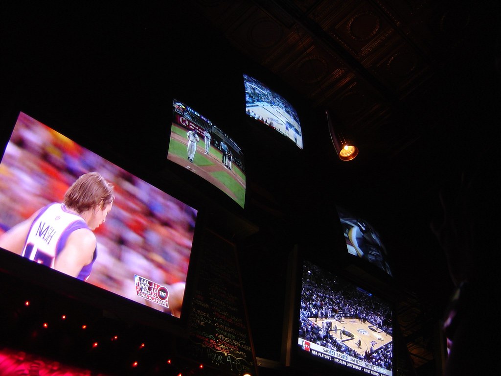 Sports bar with TV screens.