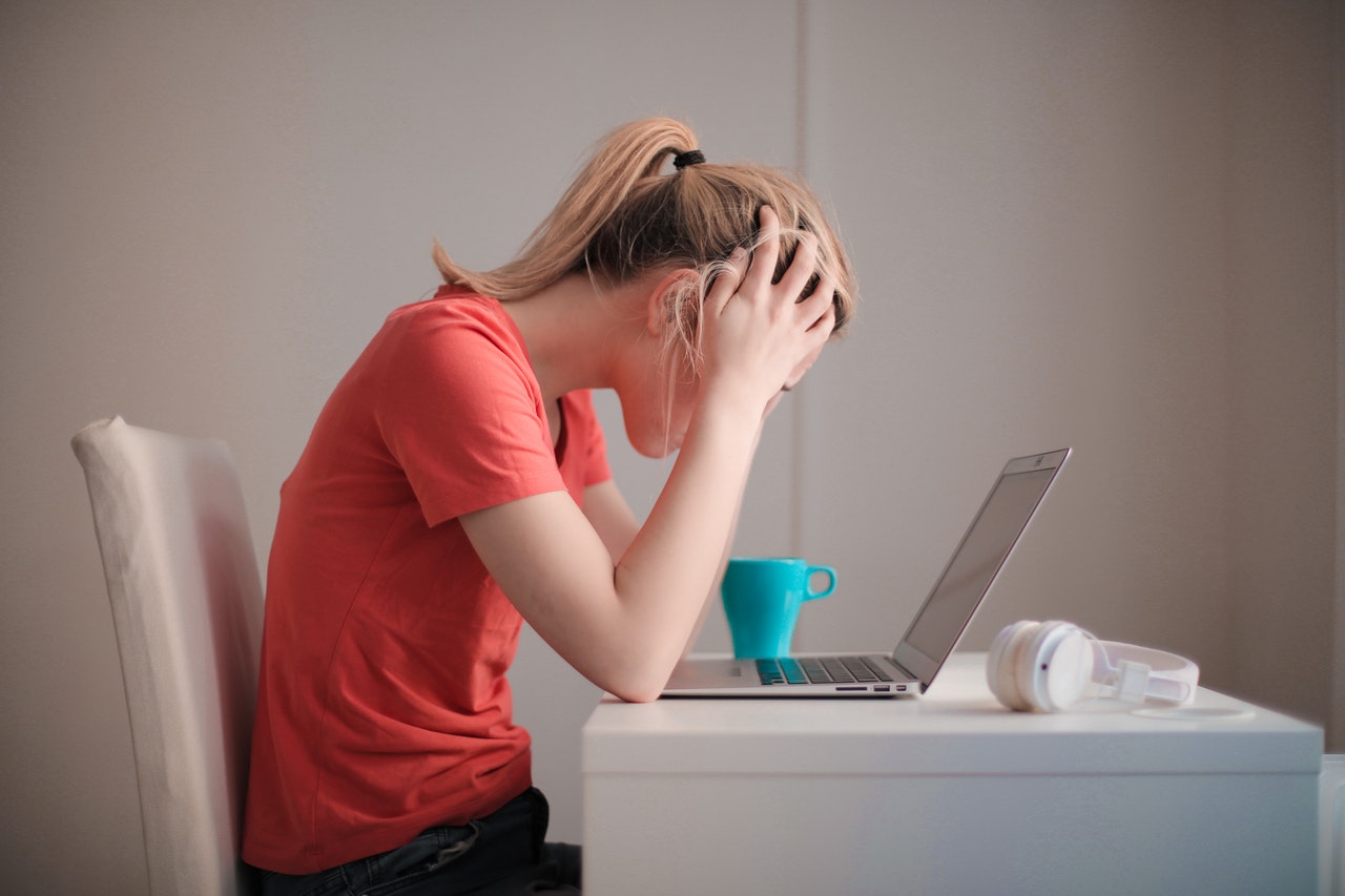 Young blonde woman used to show fear about new mortgage stress test.