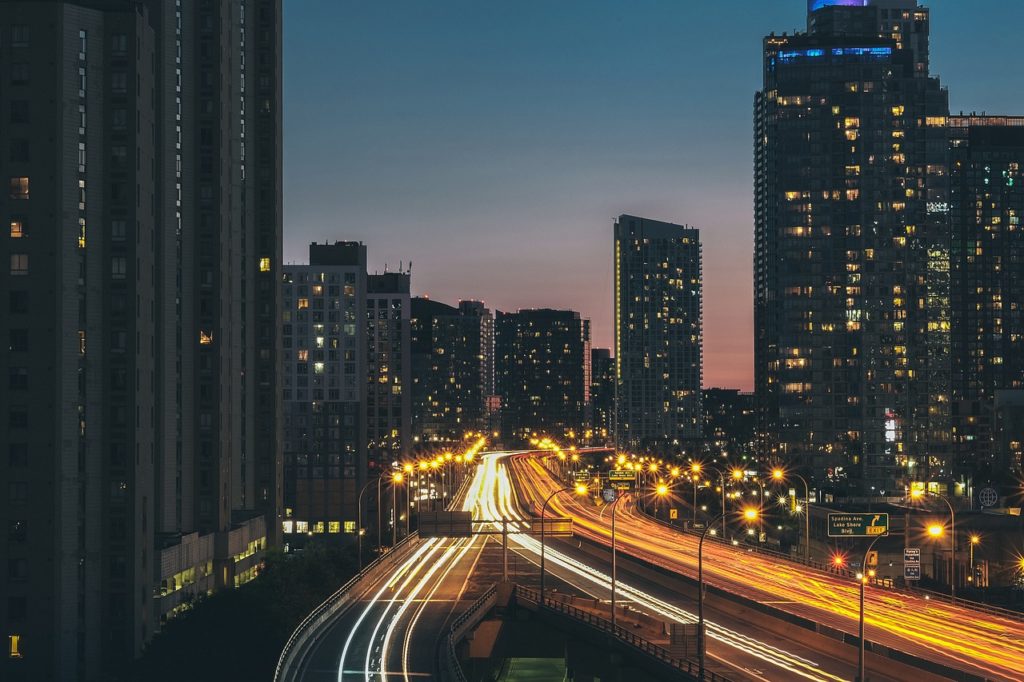 Toronto cars and buildings at night.