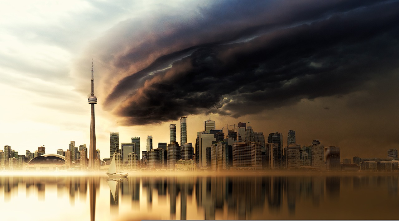 Toronto skyline with storm cloud showing grim September 2022 housing outlook for sellers.