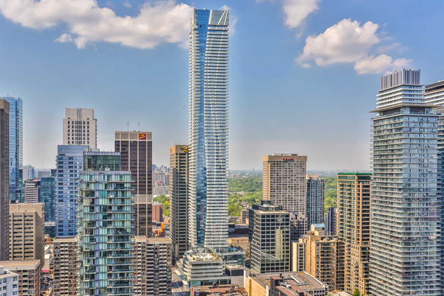 Toronto skyline, daytime, showing One Bloor Condos on 1 Bloor St E Unit 4905, the fifth most expensive property.