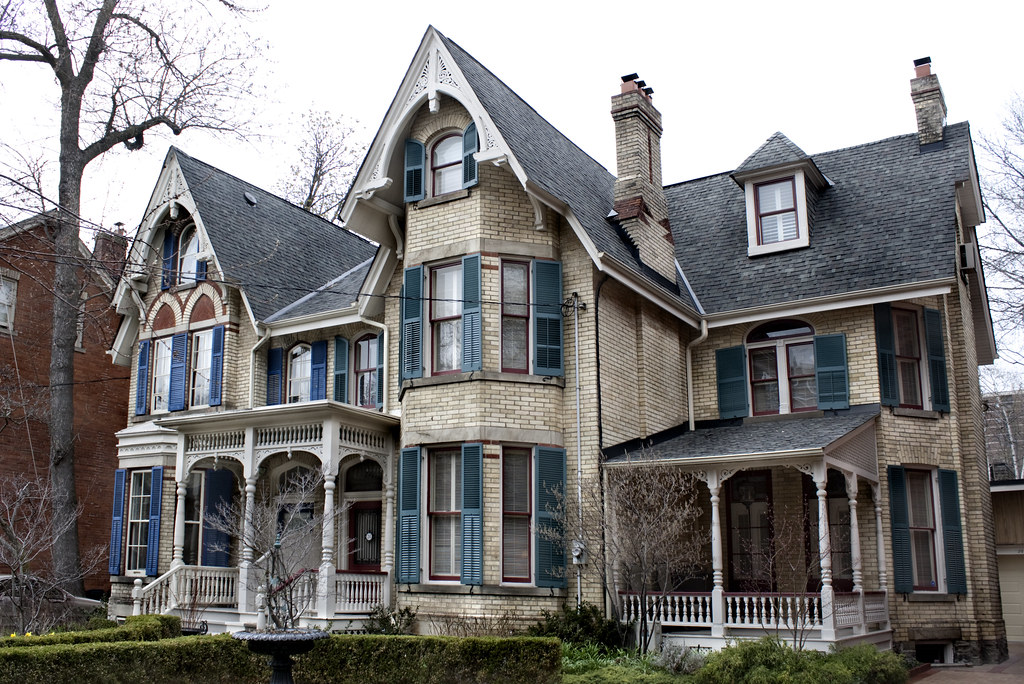 Victorian mansion exterior in Toronto's luxury real estate market.