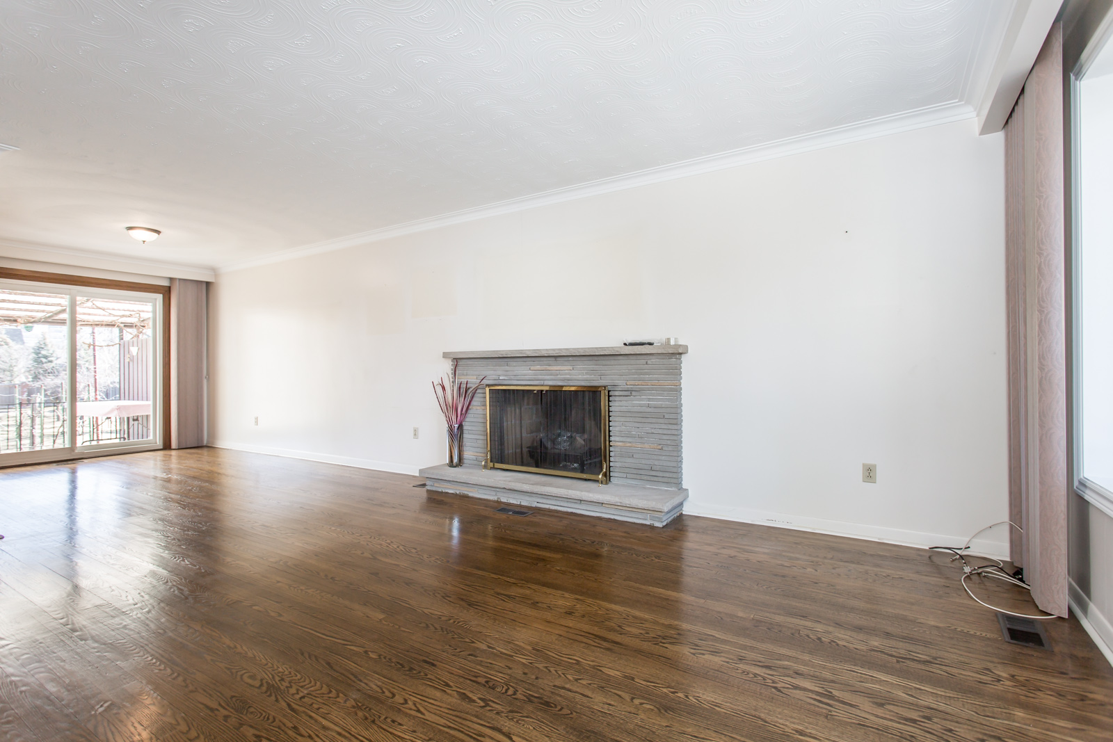 Photo of fireplace. It heats up this room and the room opposite.