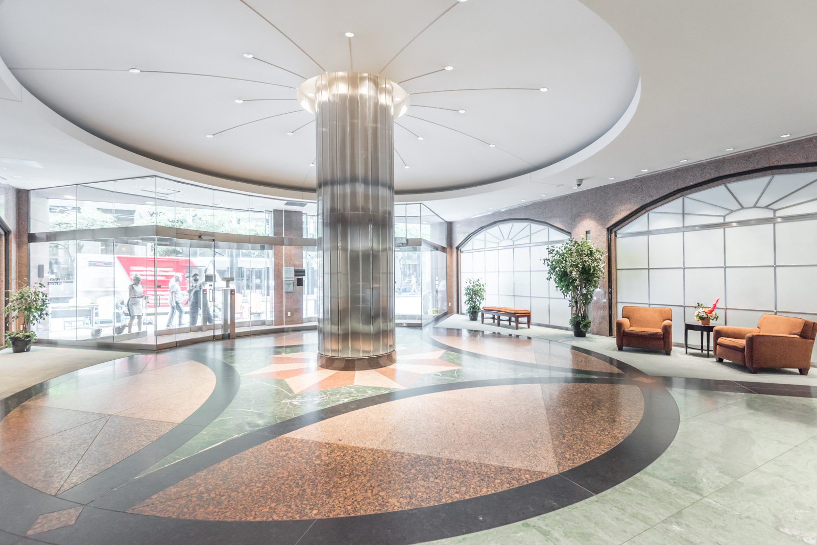 A rather beautiful image of the lobby. Everything is sleek and shiny.