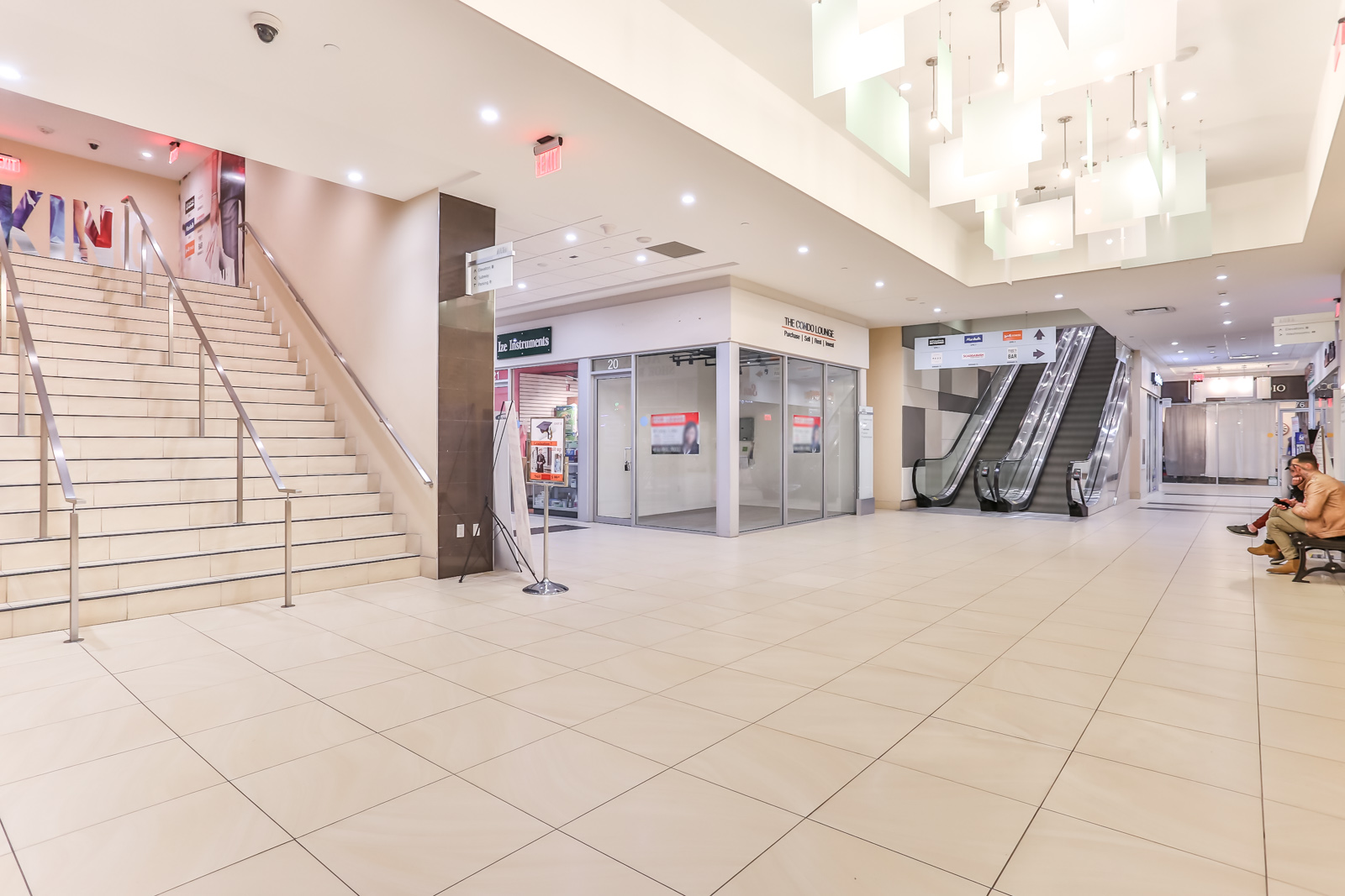 Photo of stairs and escalator with unit 20 at the centre.