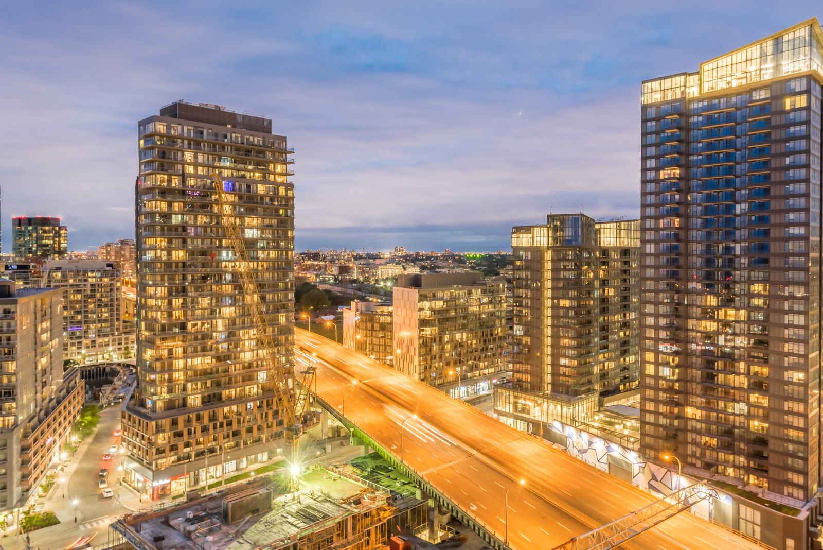 Another night view, this time of the Garidener Expressway and surrounding buildings.