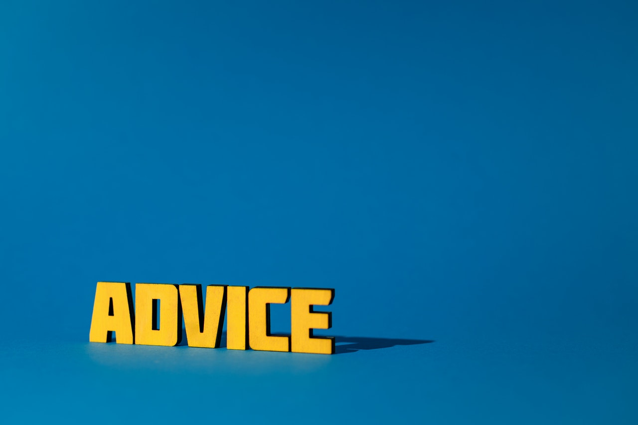 Word ADVICE in yellow letters on blue background.