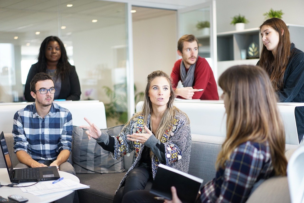 Young professionals having discussion at work.