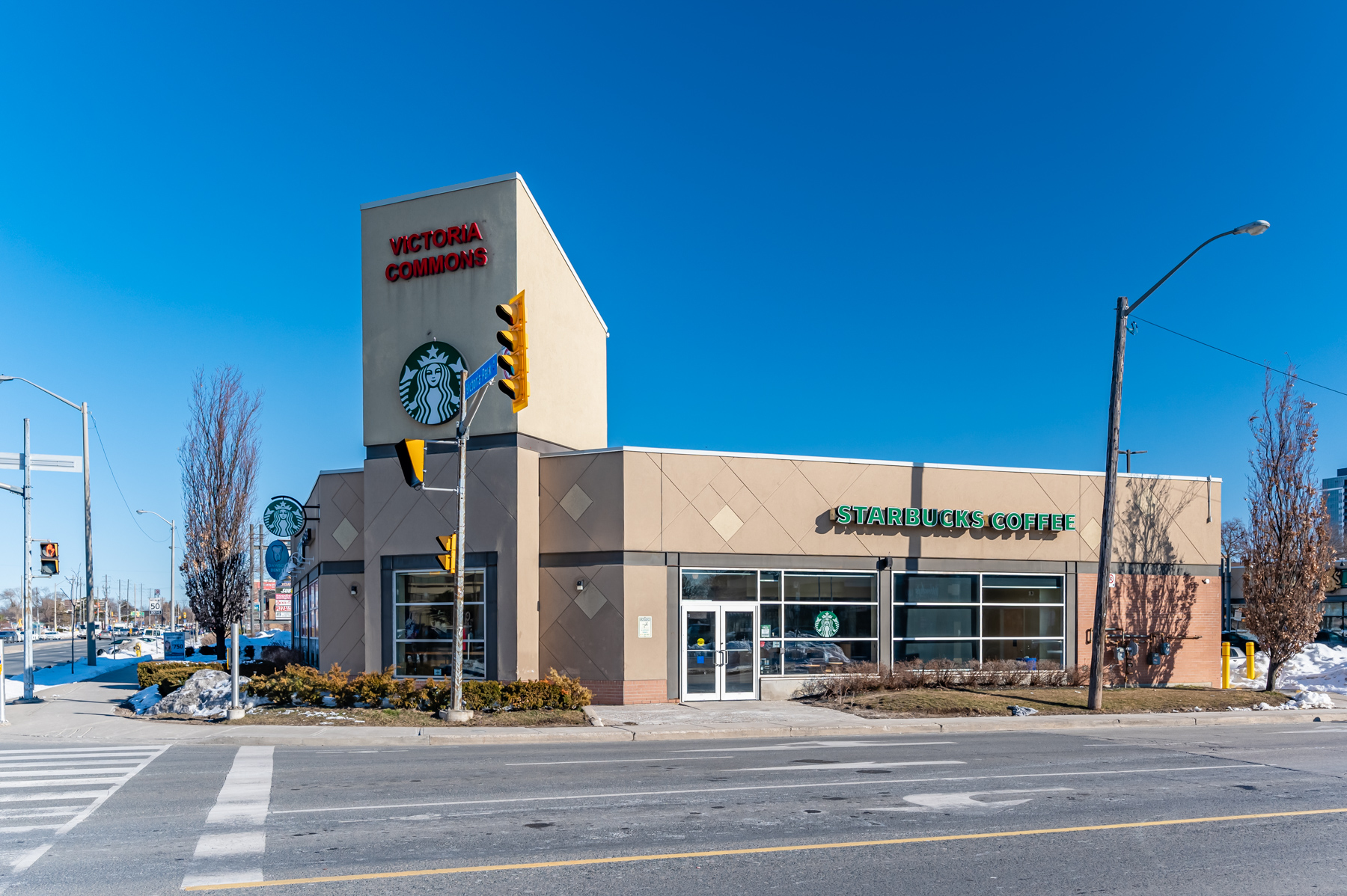 Starbucks Coffee store at Victoria Commons mall, as seen from across street.