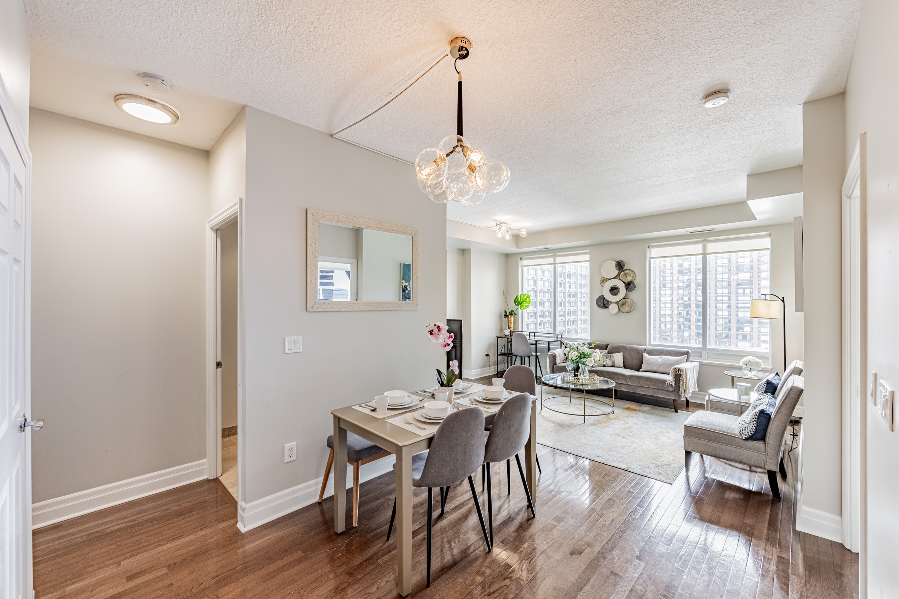 35 Balmuto St Unit 1209 dining room with modern light-fixture.