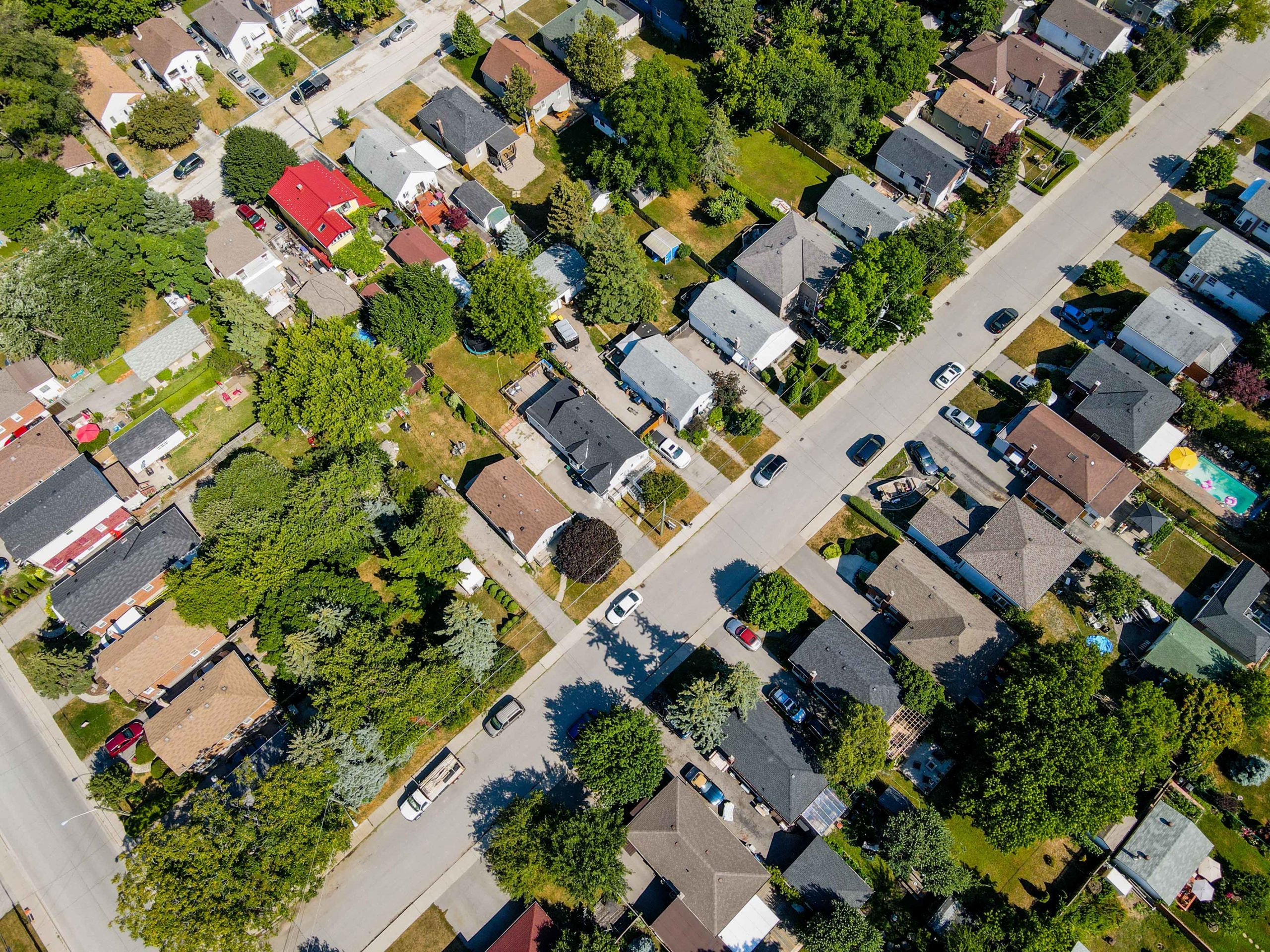 Aerial drone photo of tops of houses in Toronto suburbs.