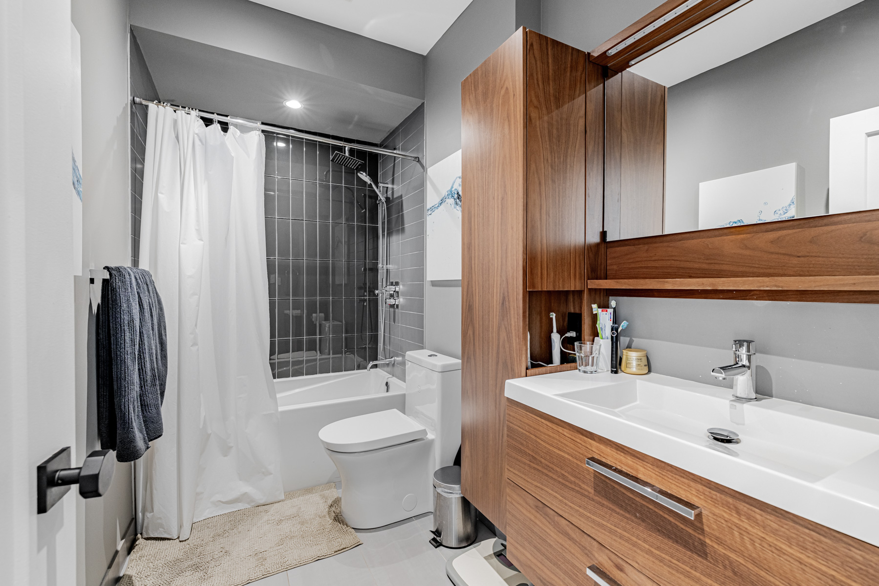 4-piece ensuite bath with granite counters, vanity, soaker tub and rain shower.