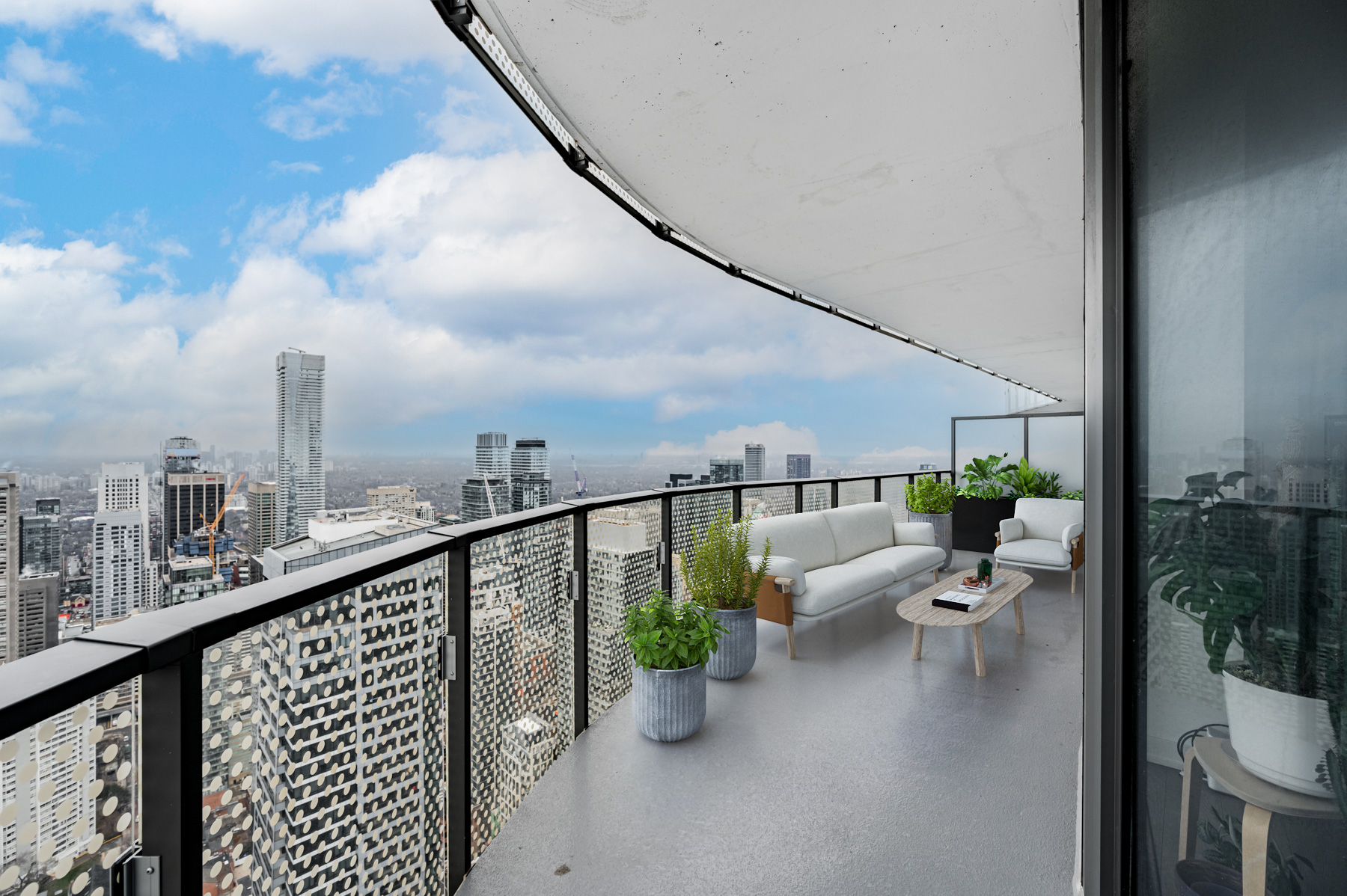 Condo balcony ending in glazed divider.