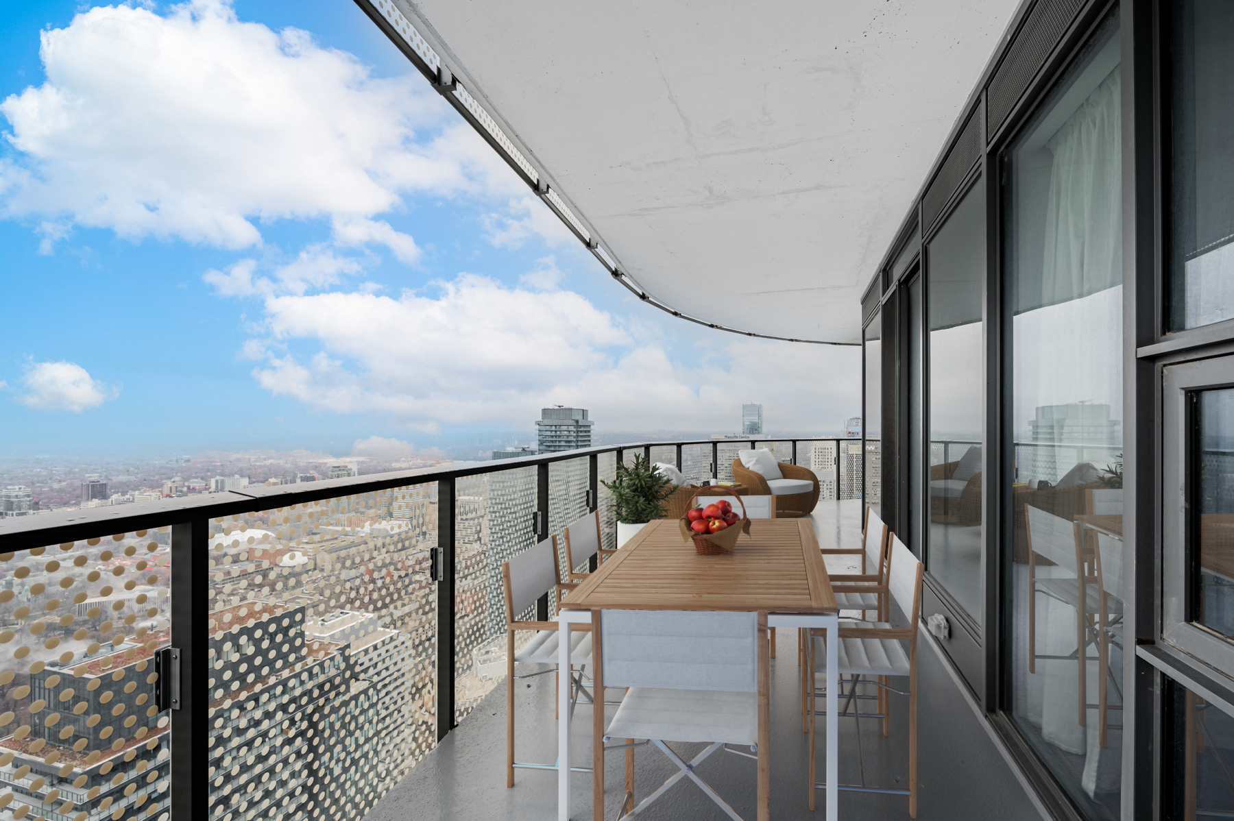 Large condo balcony overlooking downtown Toronto.