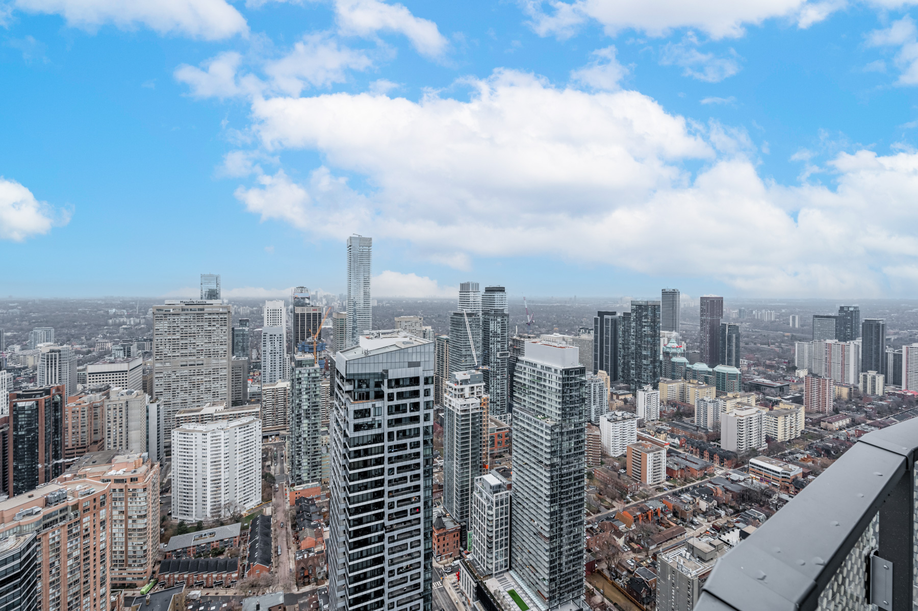 58th floor view of Toronto from balcony of 11 Wellesley St W Unit 5808.