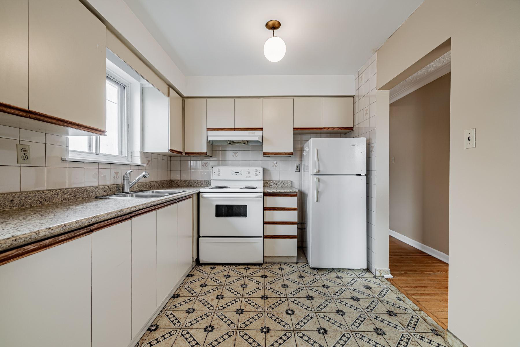 Large kitchen with several cabinets, drawers and cupboards – 1 Stong Court.