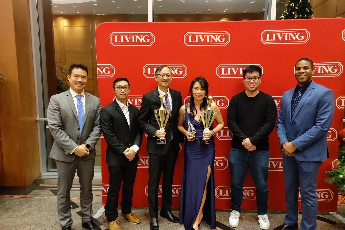 Group photo of Wins Lai at 2022 Living Realty Top Producer Awards.