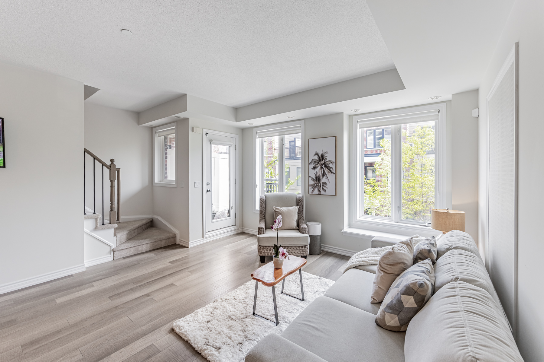 Brightly lit living room of 20 Carnation Ave Unit 42.