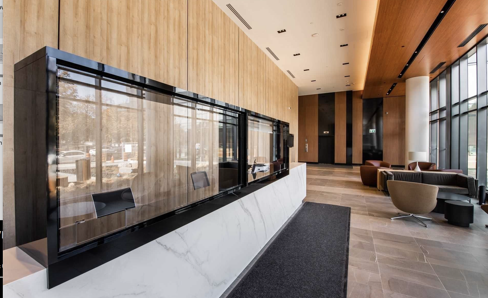 Tall wood-paneled lobby of Home Power and Adelaide condo.