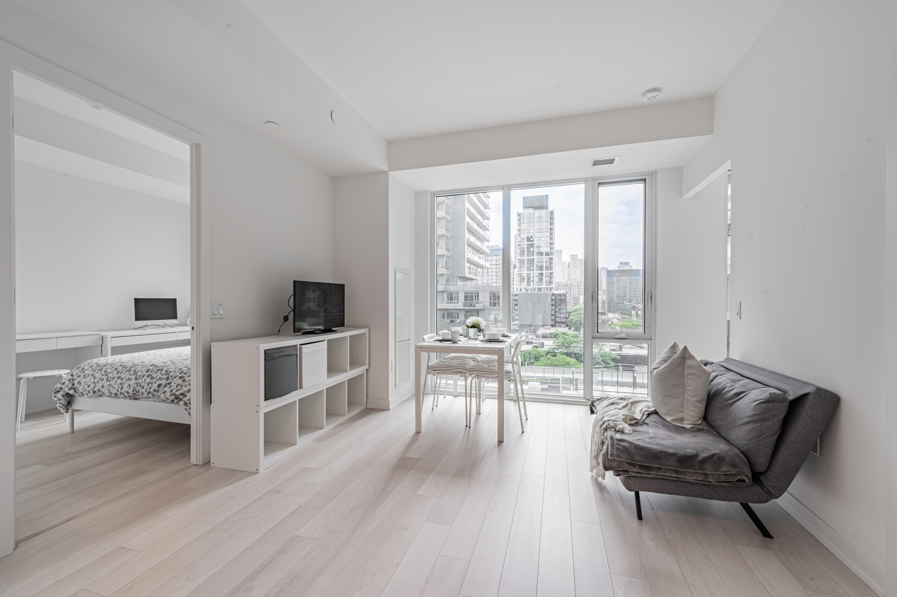 Spacious, naturally lit living room of 50 Power St Unit 618.