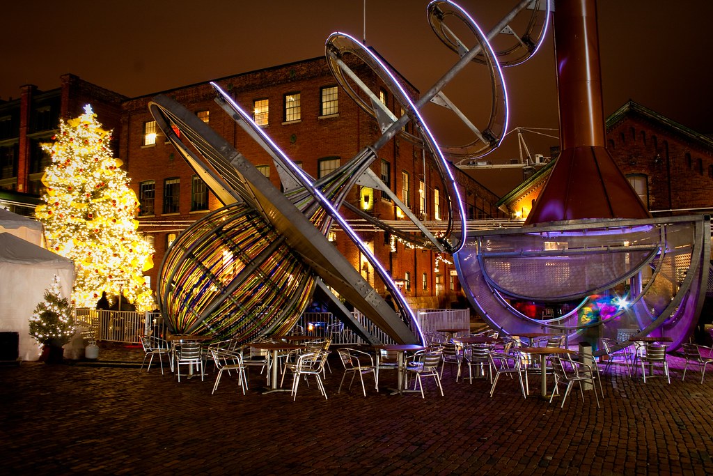 Huge outdoor street art installation at night in Distillery District in Toronto. 