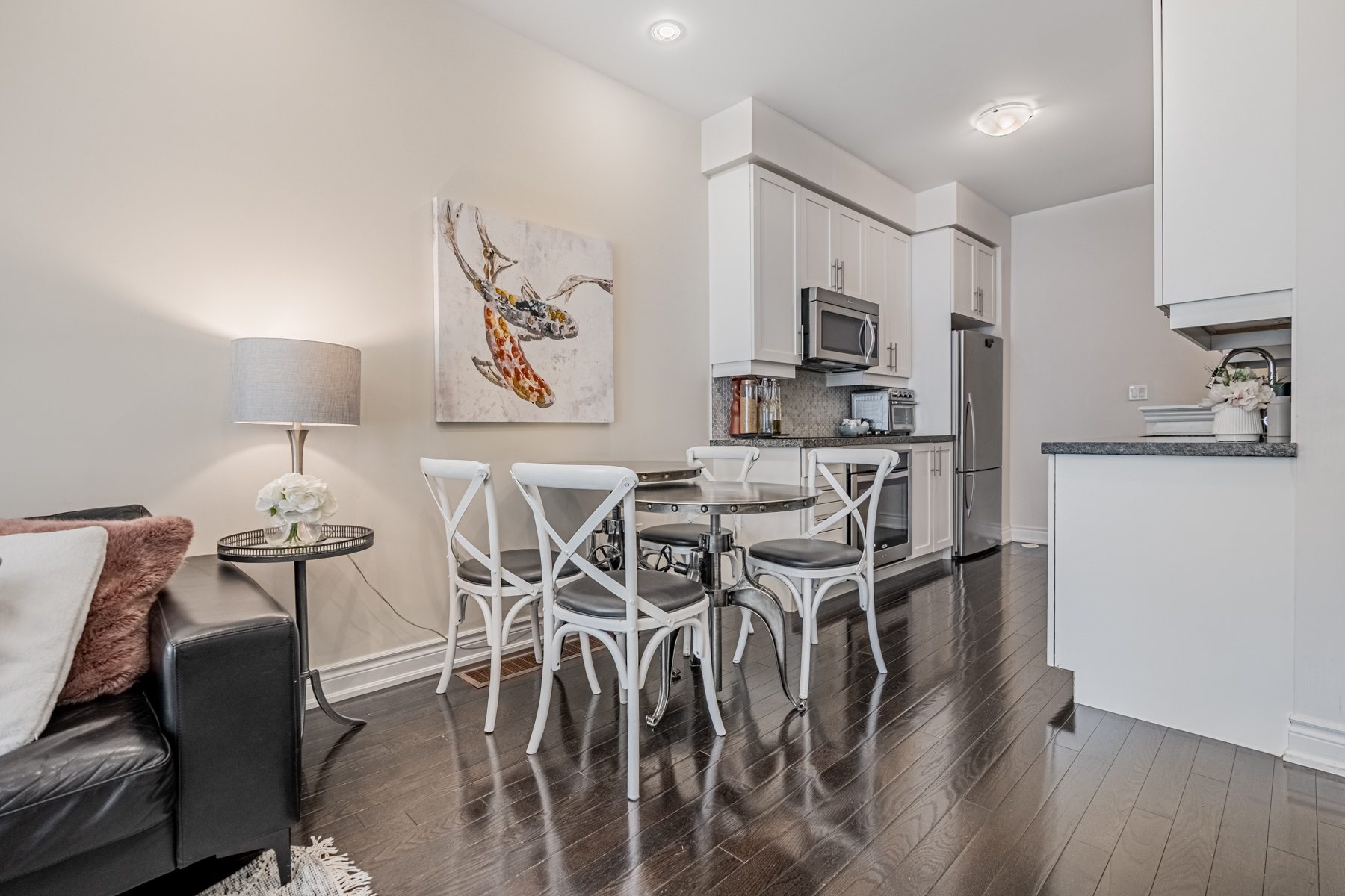 Polished brown hardwood floors of 2132 Bayview Ave Unit 199 dining and living room.