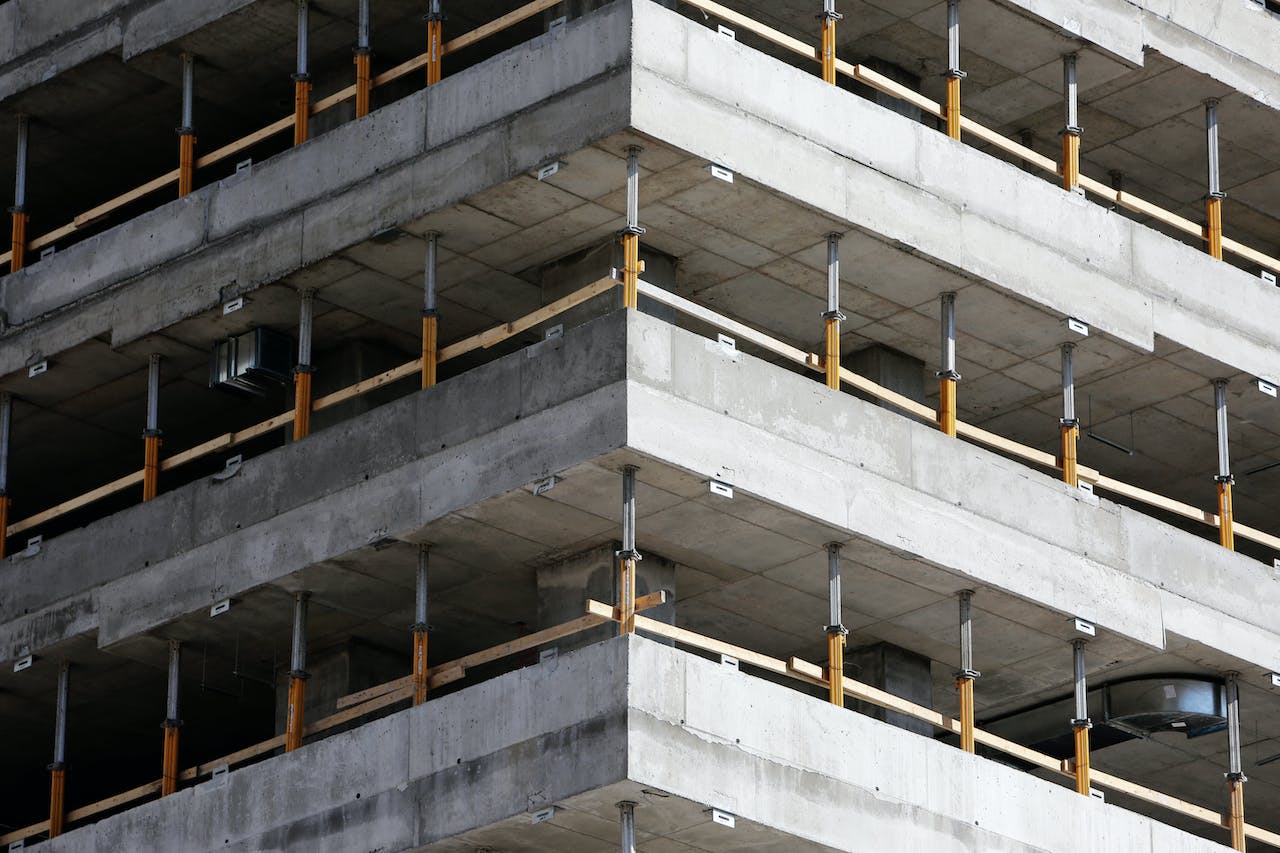 Close up of concrete exterior of building under construction.