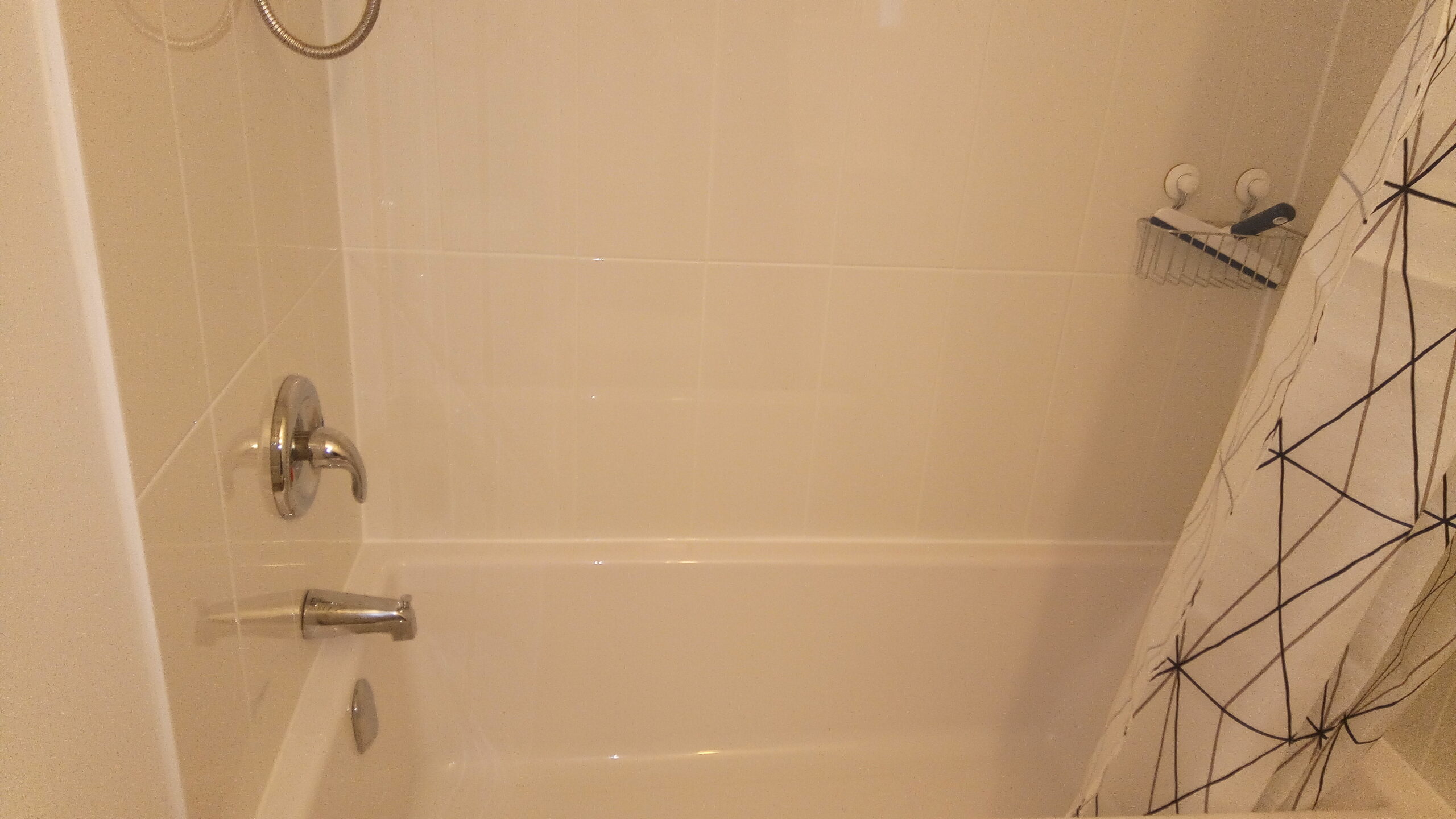 Close up of bathtub in bathroom of 2133 Dufferin St – Second Floor Rental Unit A.
