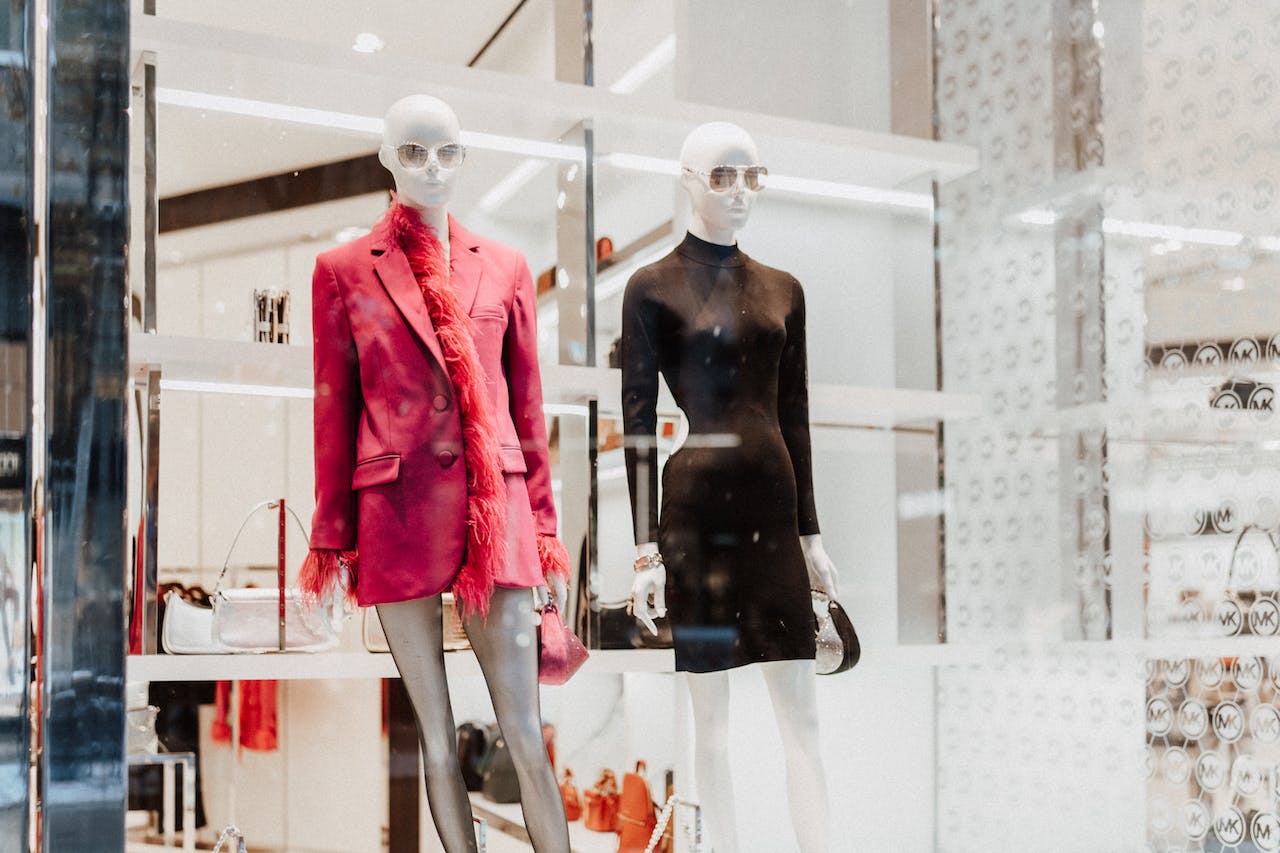 Two female mannequins in store display.