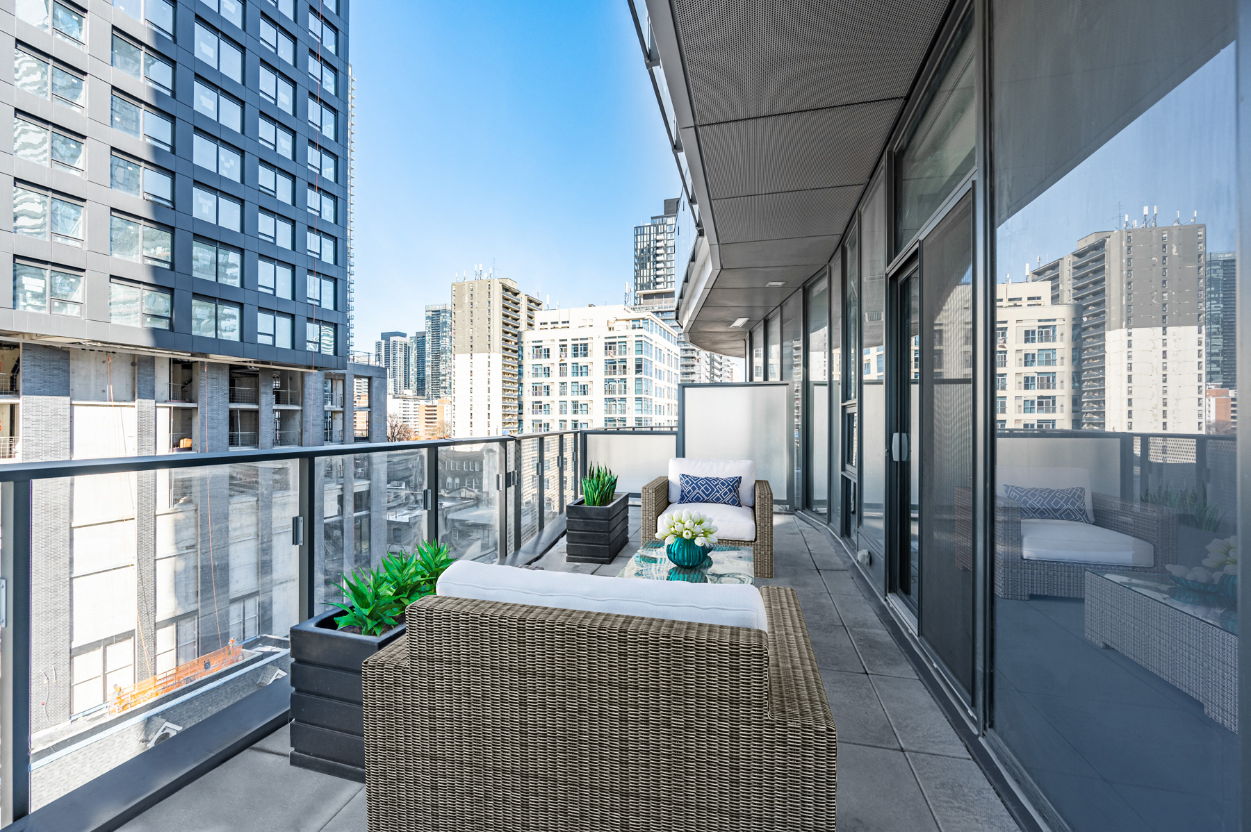 Huge terrace with 3D rendered furniture – 11 Wellesley St W Suite 507.