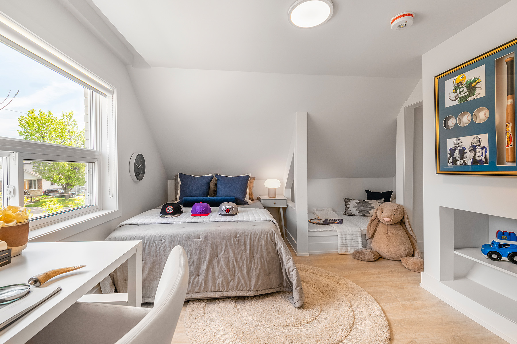54 Huntington Avenue – second bedroom with wall nooks, bed, furniture and kid's toys.