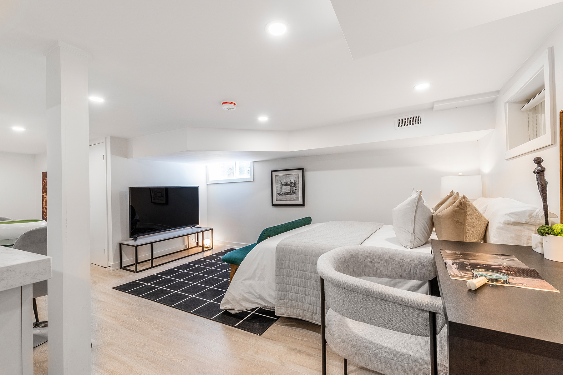 Finished basement bedroom with TV – 54 Huntington Avenue.