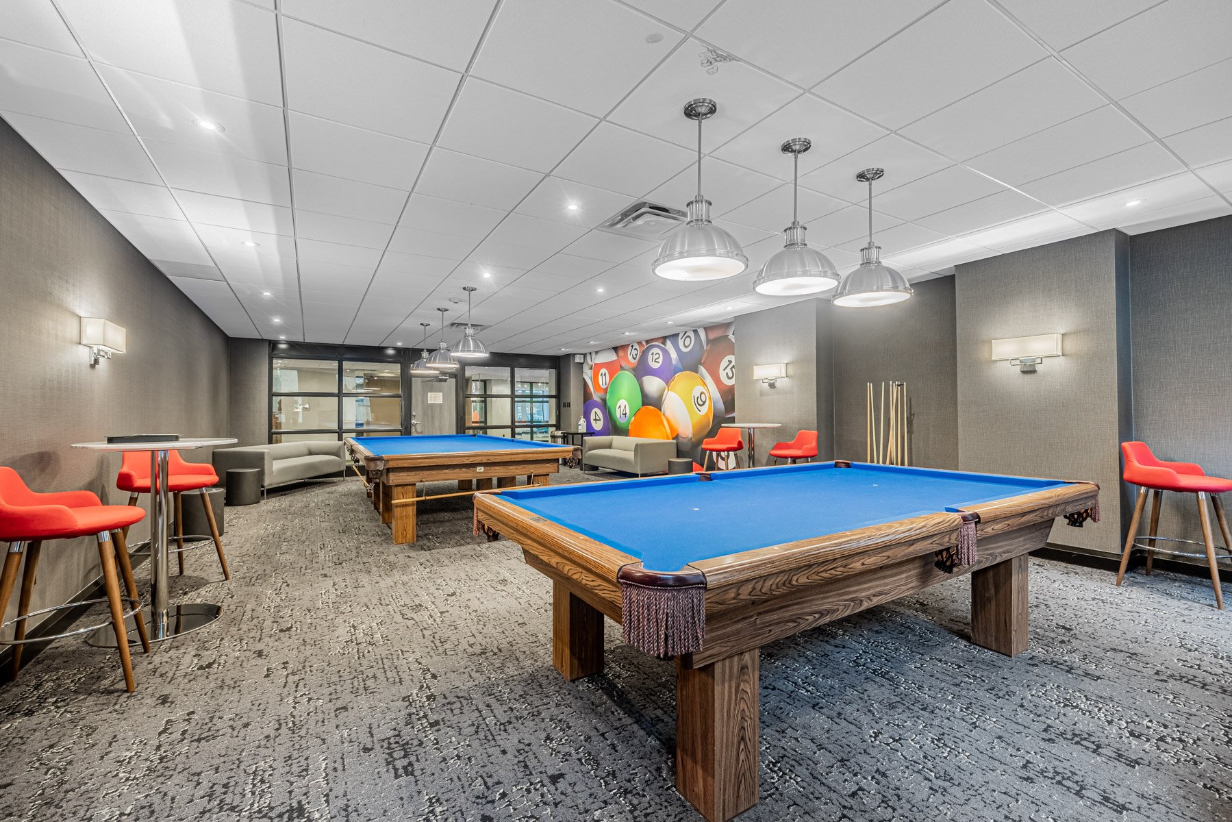 Lexington Condos rec centre with billiards tables.