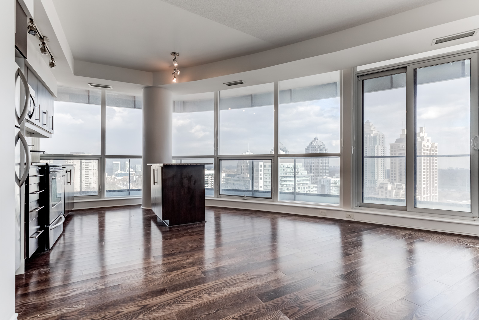 Condo with wrap-around balcony offering 180-degree view of North York, Toronto.