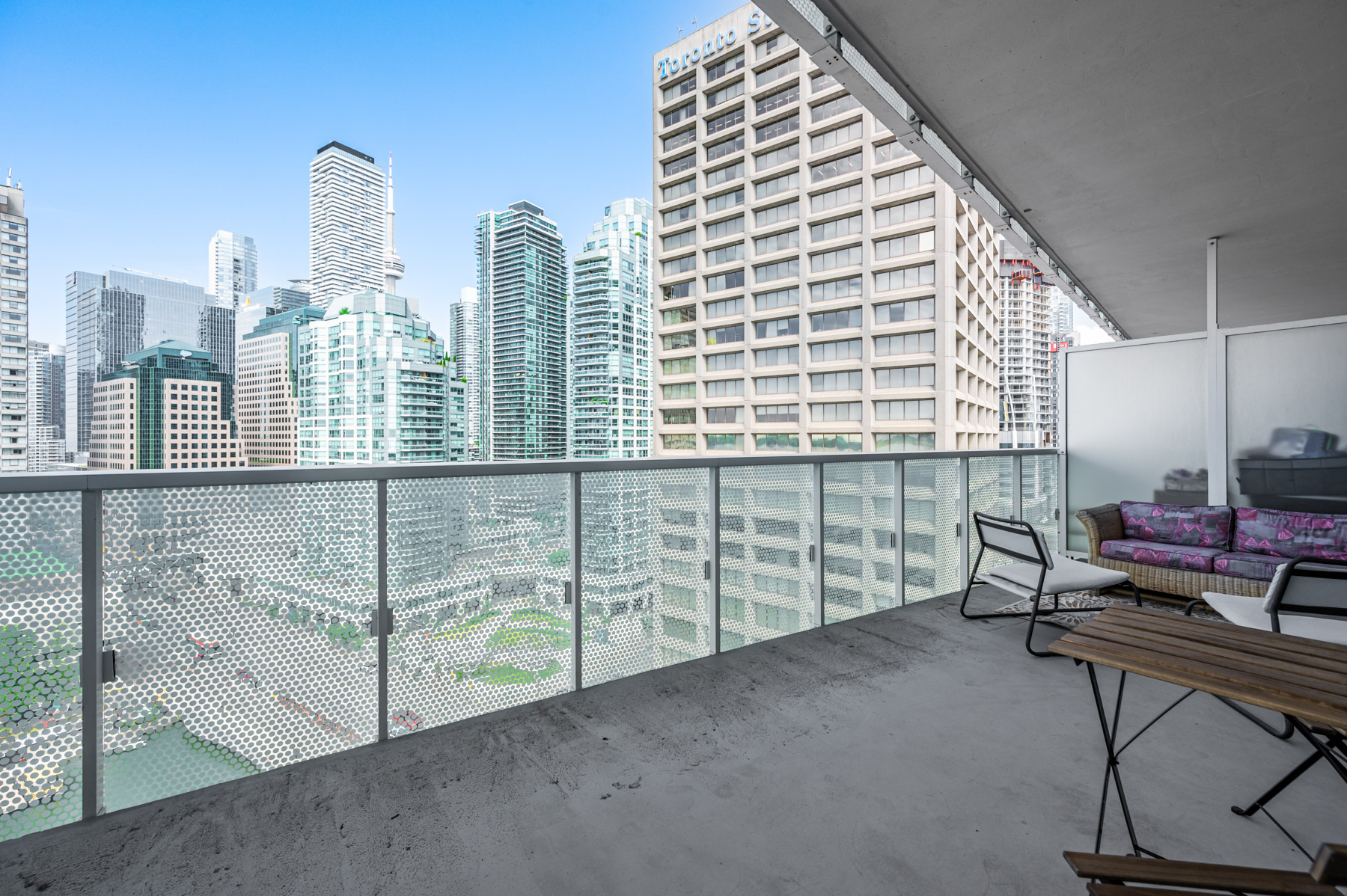 View of CN Tower and Toronto Star building from condo balcony.