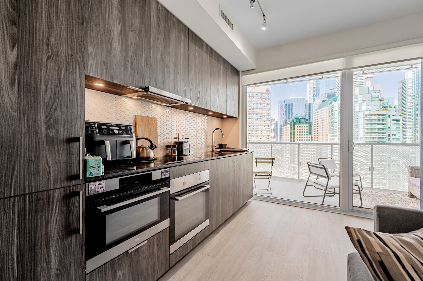 Kitchen with view of Toronto skyline.