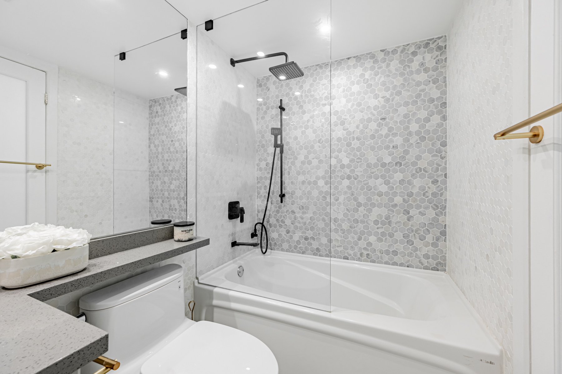 Modern 4-piece condo bath with framless glass shower and soaker tub – 8 Park Rd Unit 2315.