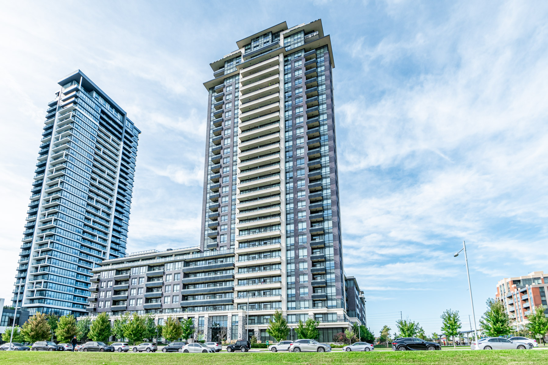 Glassy, geometric exterior of Riverside Condos.