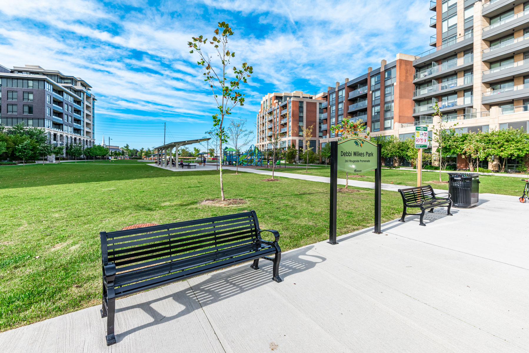 Debbi Wilkes Park with benches and playground.