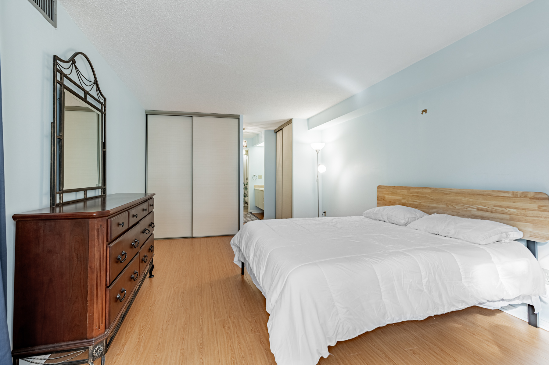 Condo bedroom with 2 closets. 