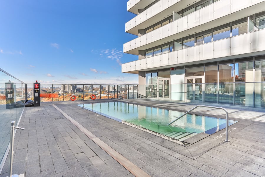 1 Thousand Bay rooftop deck with swimming pool amenity.