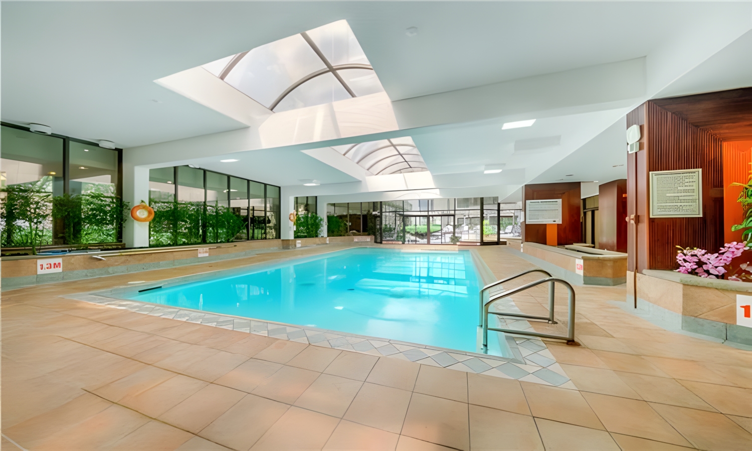 One Park Lane indoor swimming pool amenity.