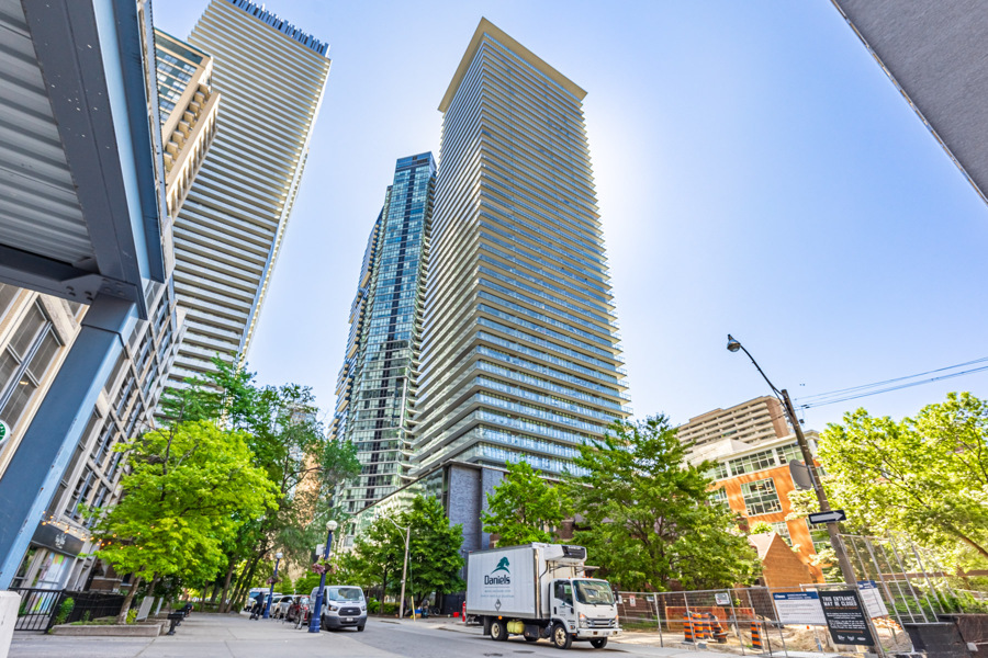 Looking up at Toronto's Casa Condos with New Modernist architecture.