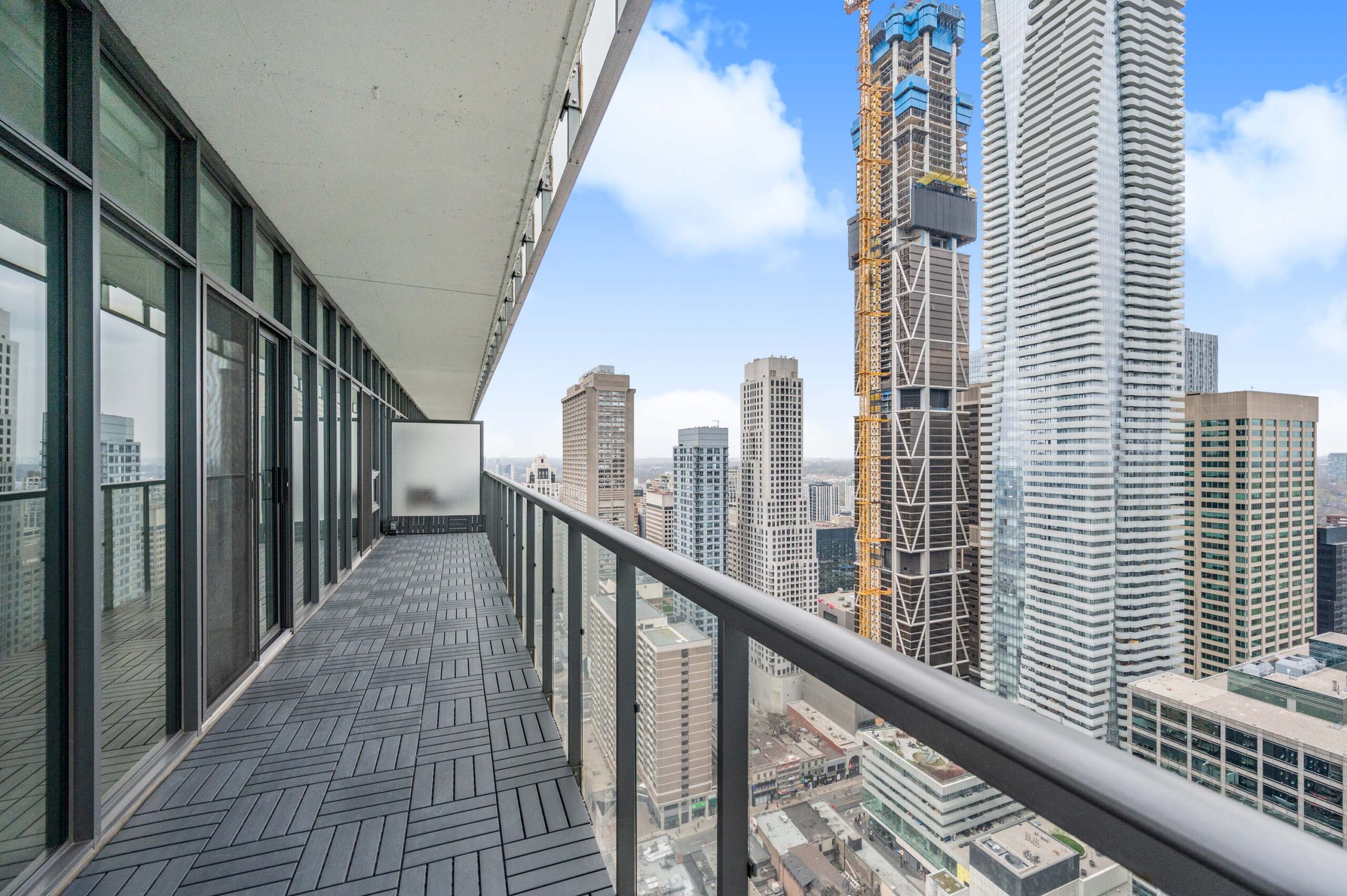 Large balcony of 33 Charles St E Unit 3808.