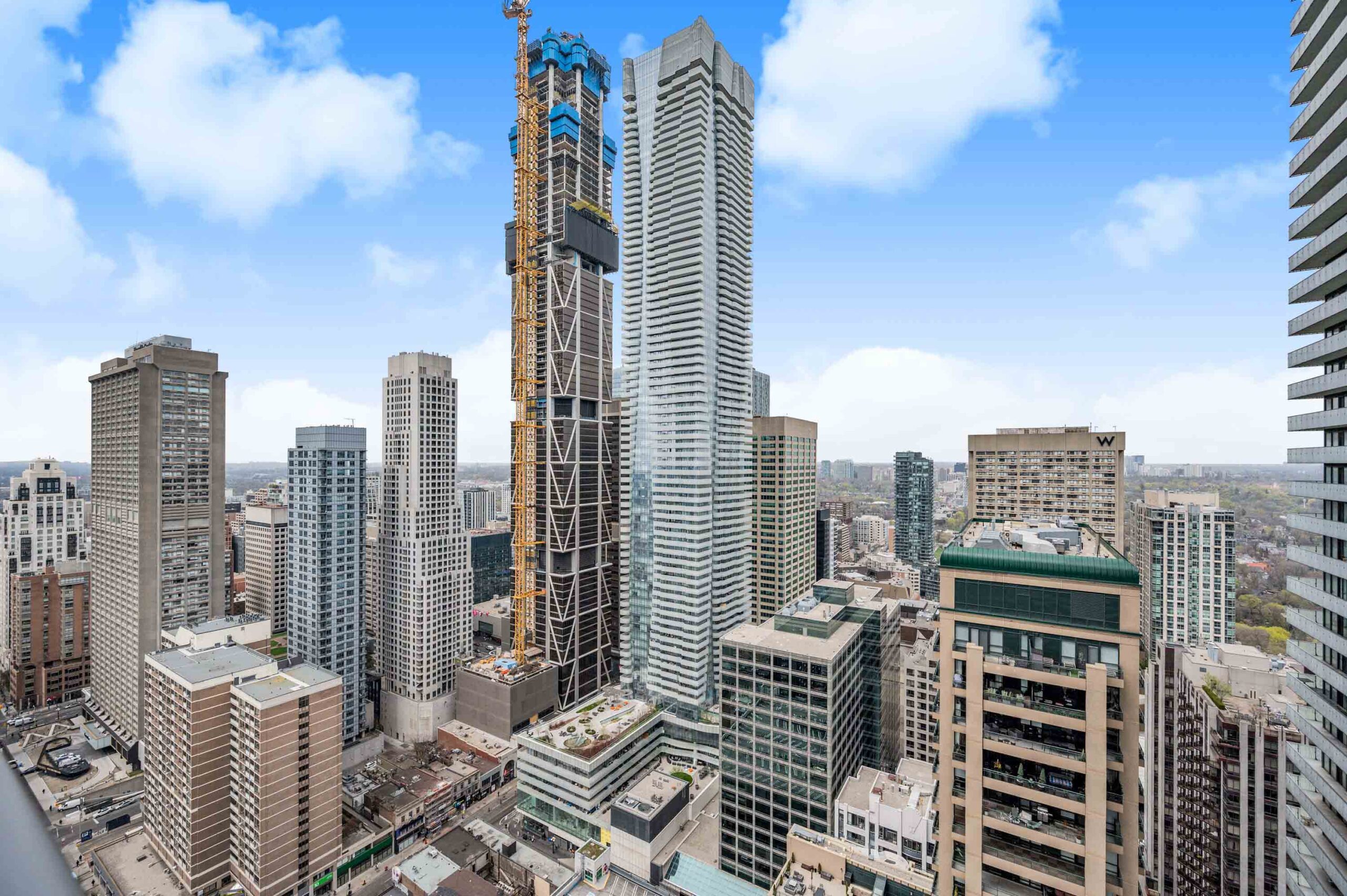 View of Toronto skyline and One Bloor Condos from 33 Charles St E Unit 3808 balcony.