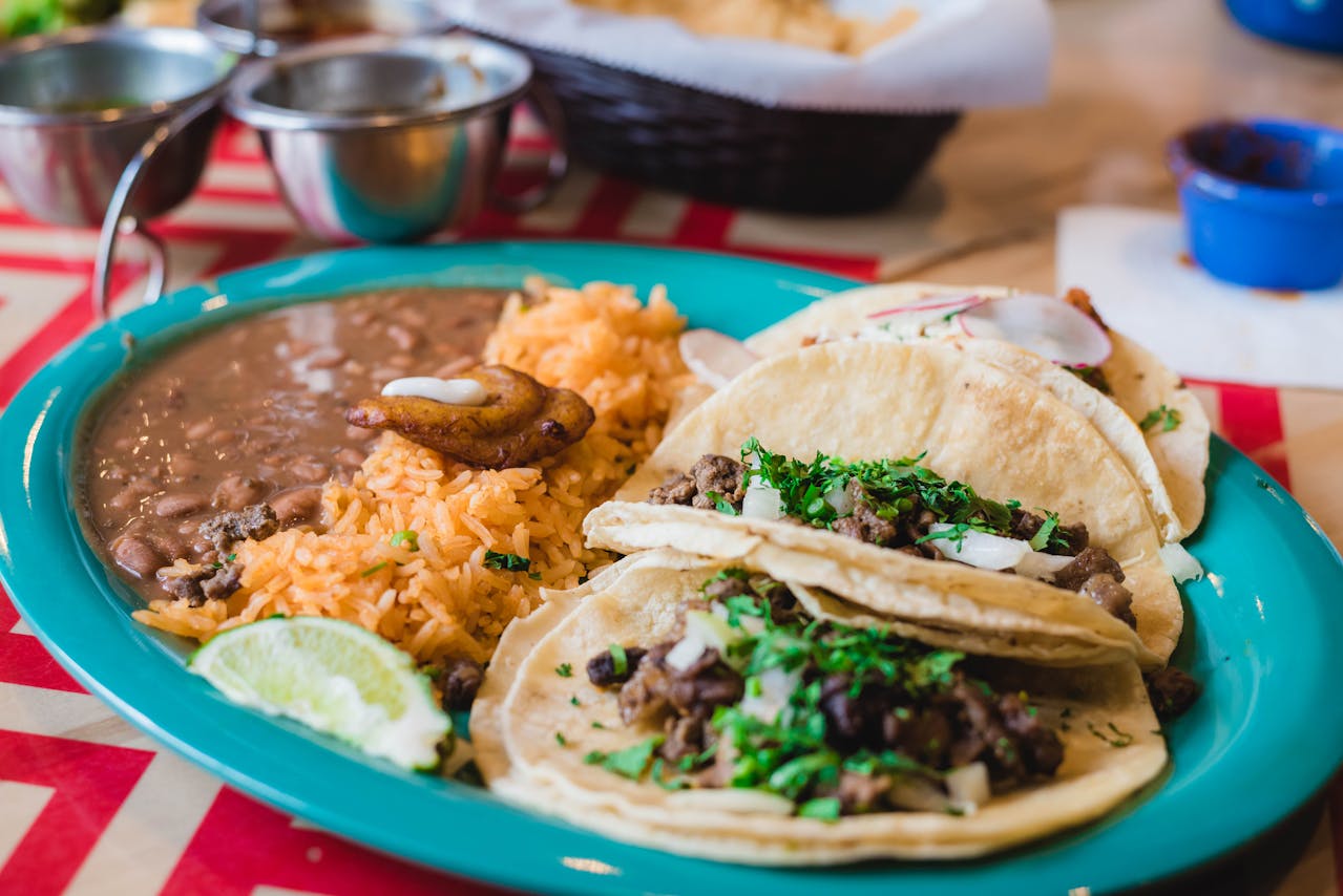 Plate of Mexican food, including taco.