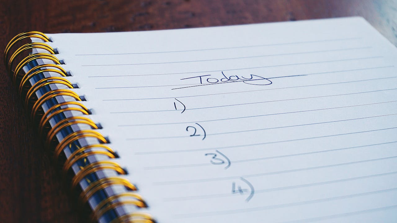 Close up of notepad checklist titled “Today” to show closing day checklist on how to sell resale property.