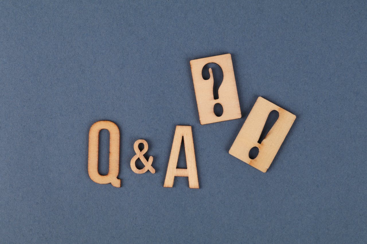 Letters Q&A, question mark and exclamation mark.