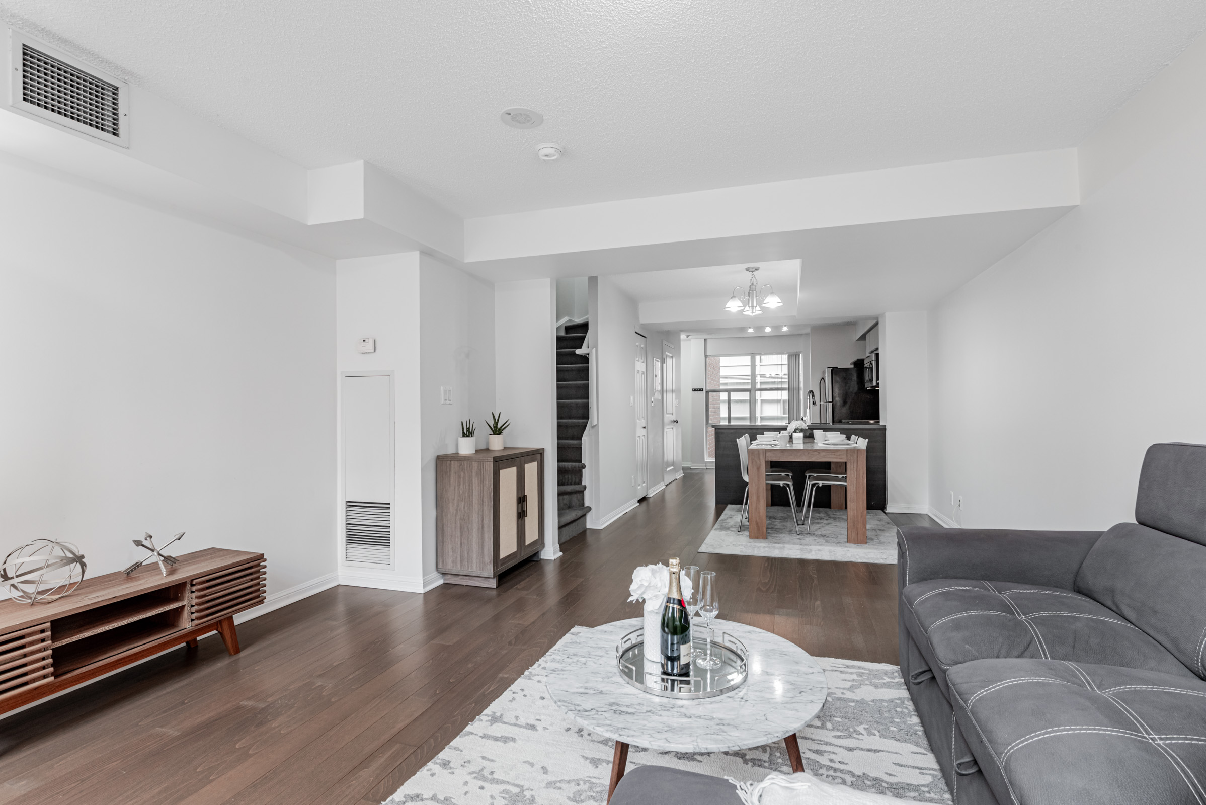 Spacious living and dining area of 11 St Joseph St Unit 311. 